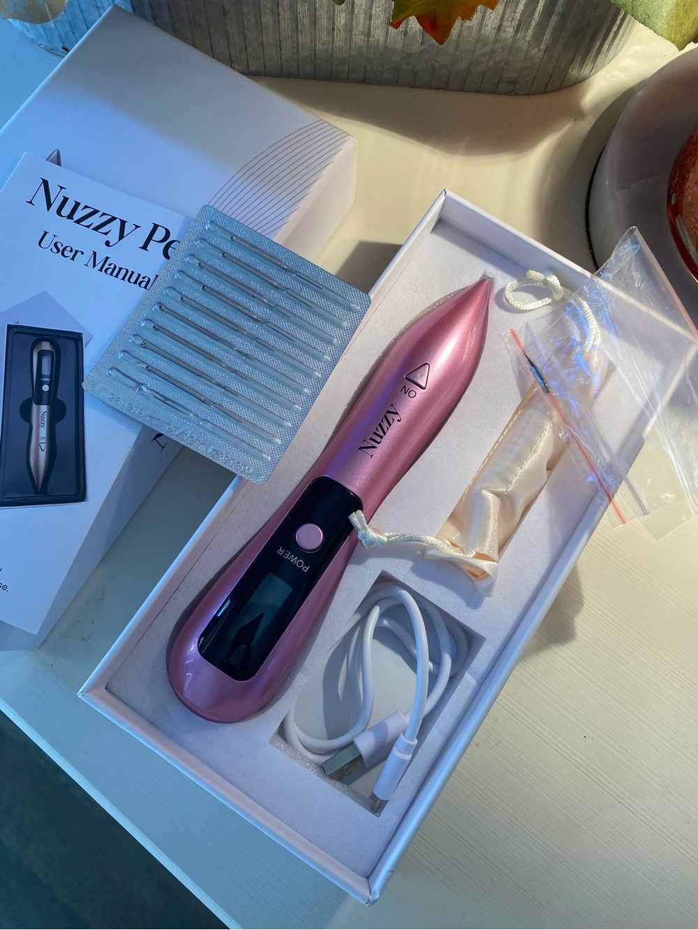 Nuzzy Pen Skin Care Device